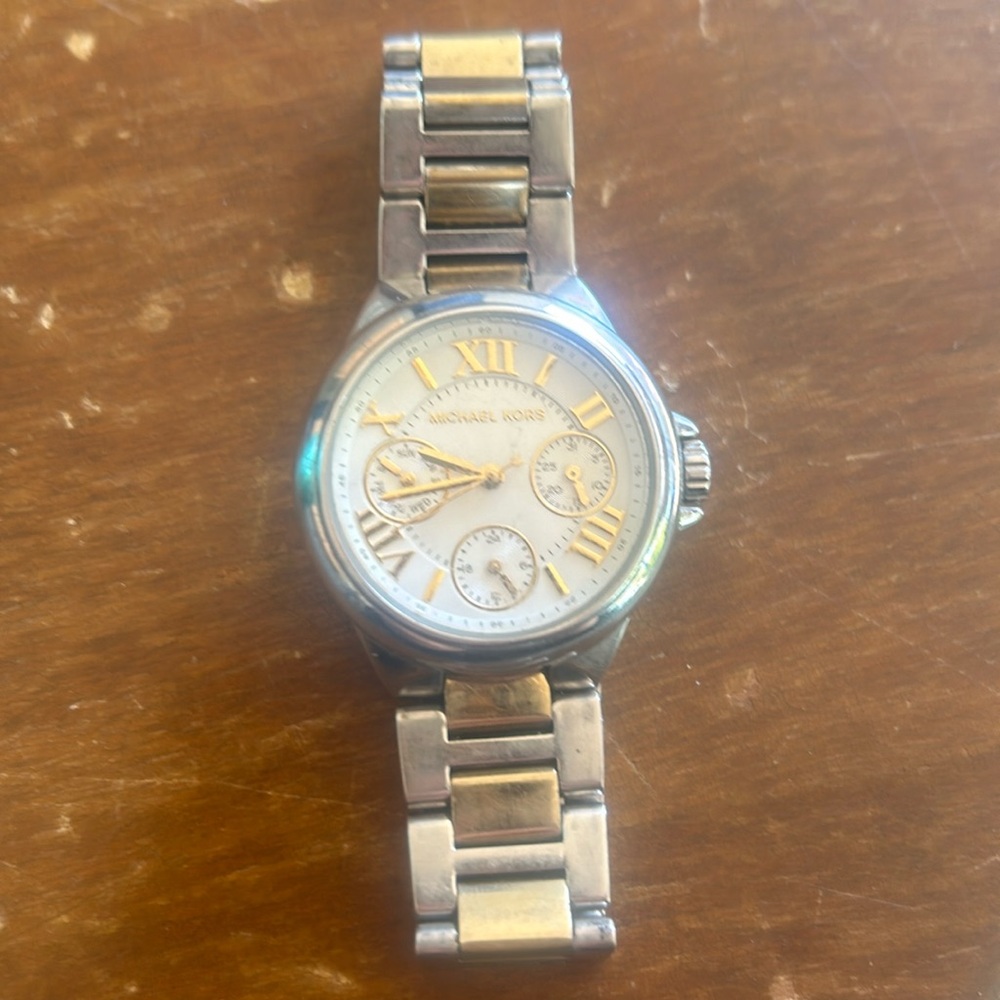 Michaell Kors two toned gold and silver watch.